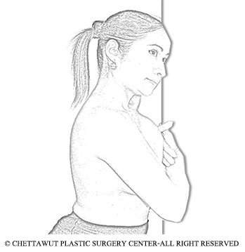 Dr.-Chettawut's-Breast-massage-technique-by-leaning-against-the-wall-while-in-standing-position